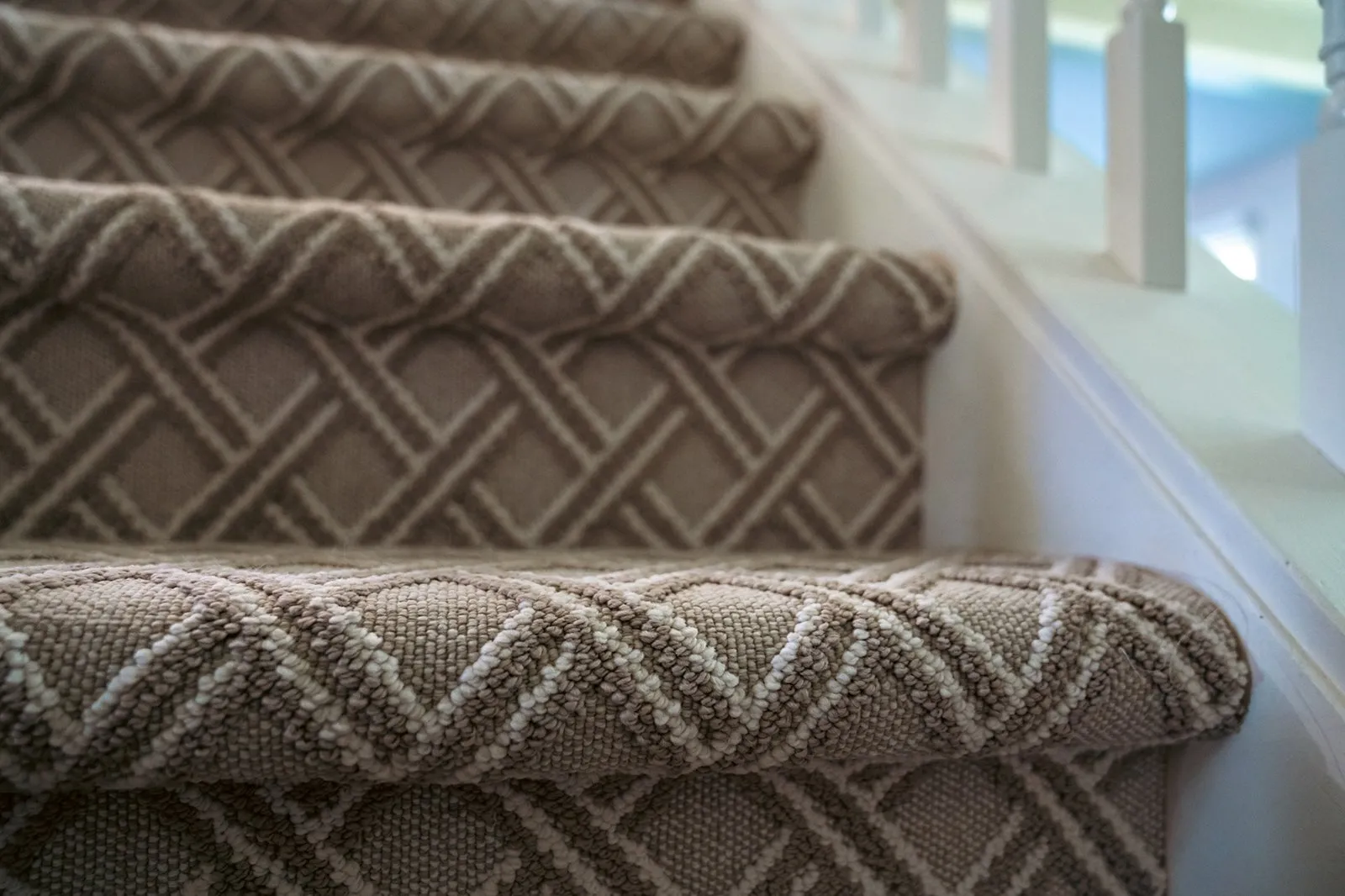 Which carpet material is best for high-traffic areas?